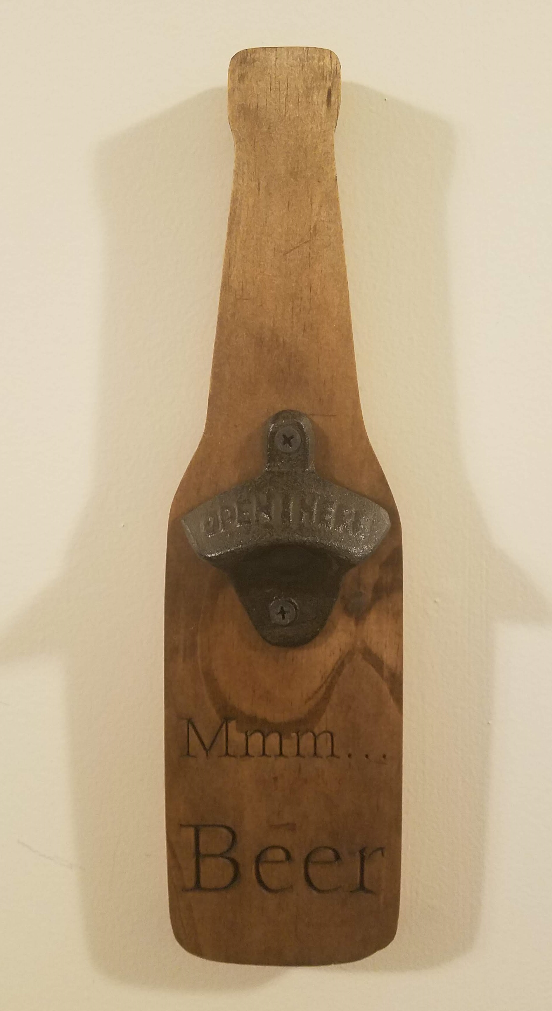 Picture of beer bottle shaped bottle opener.