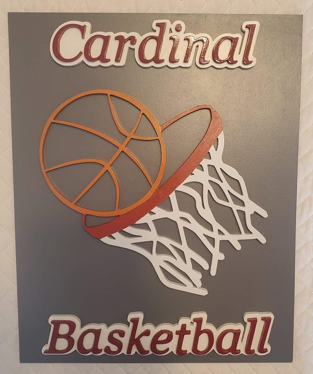 Picture of wooden raised cardinal basketball.