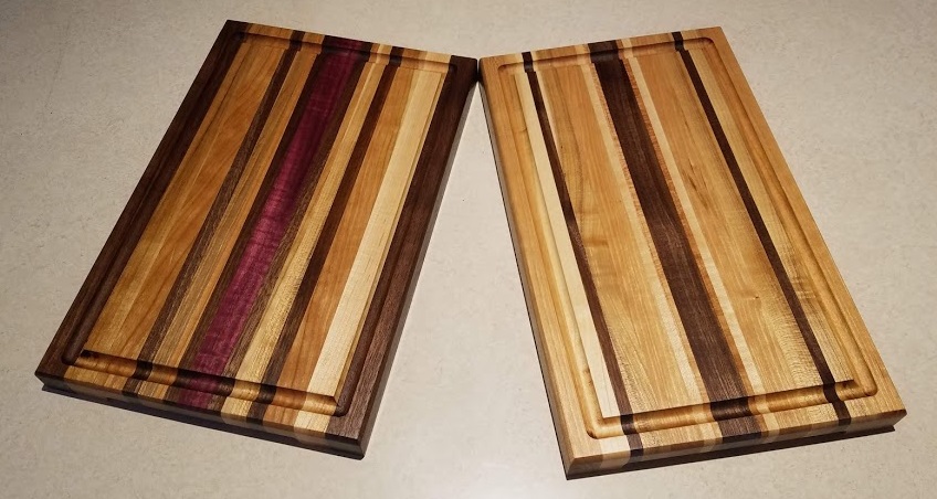 Picture of finished product of handmade cutting board. All cutting boards come with a free sample of board butter.