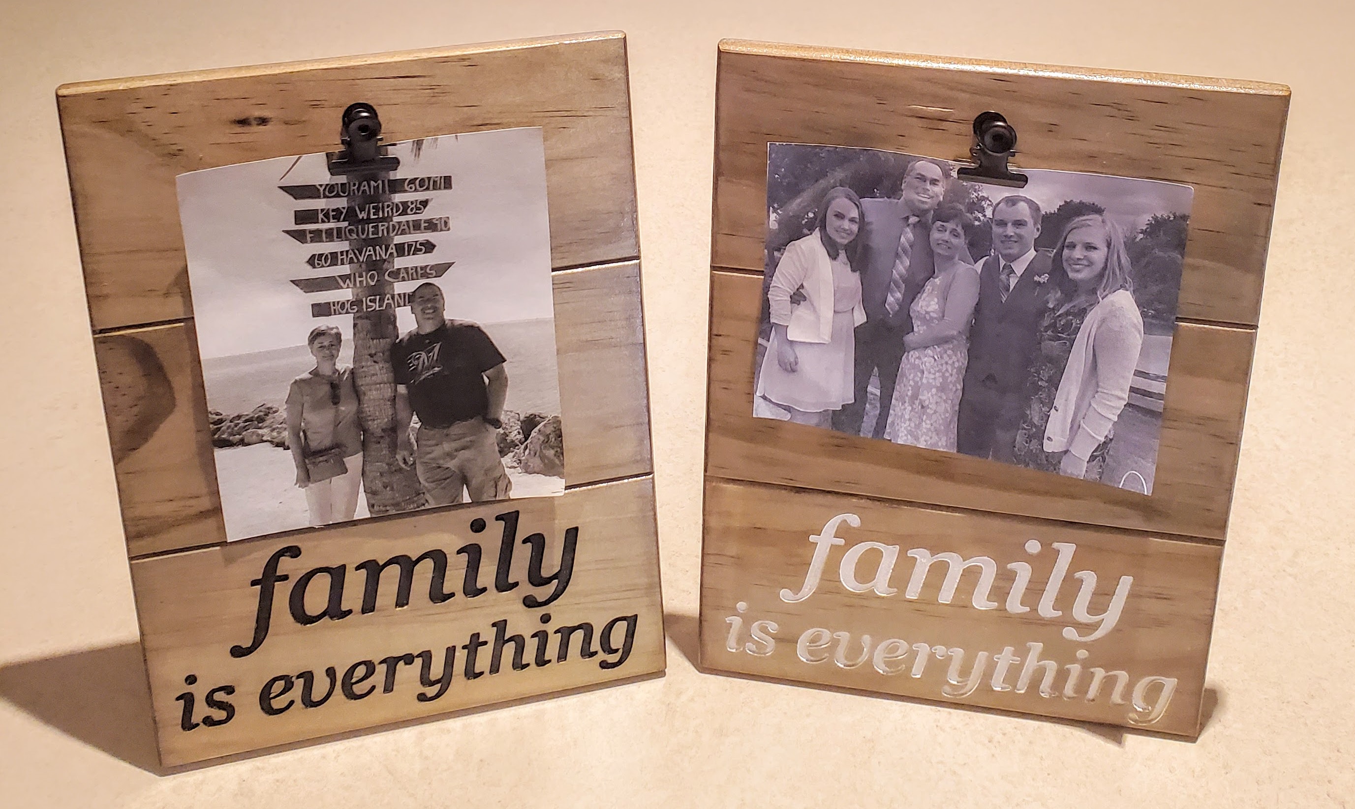 Picture of wooden picture holder. A clip is located at the top to hold a picture.