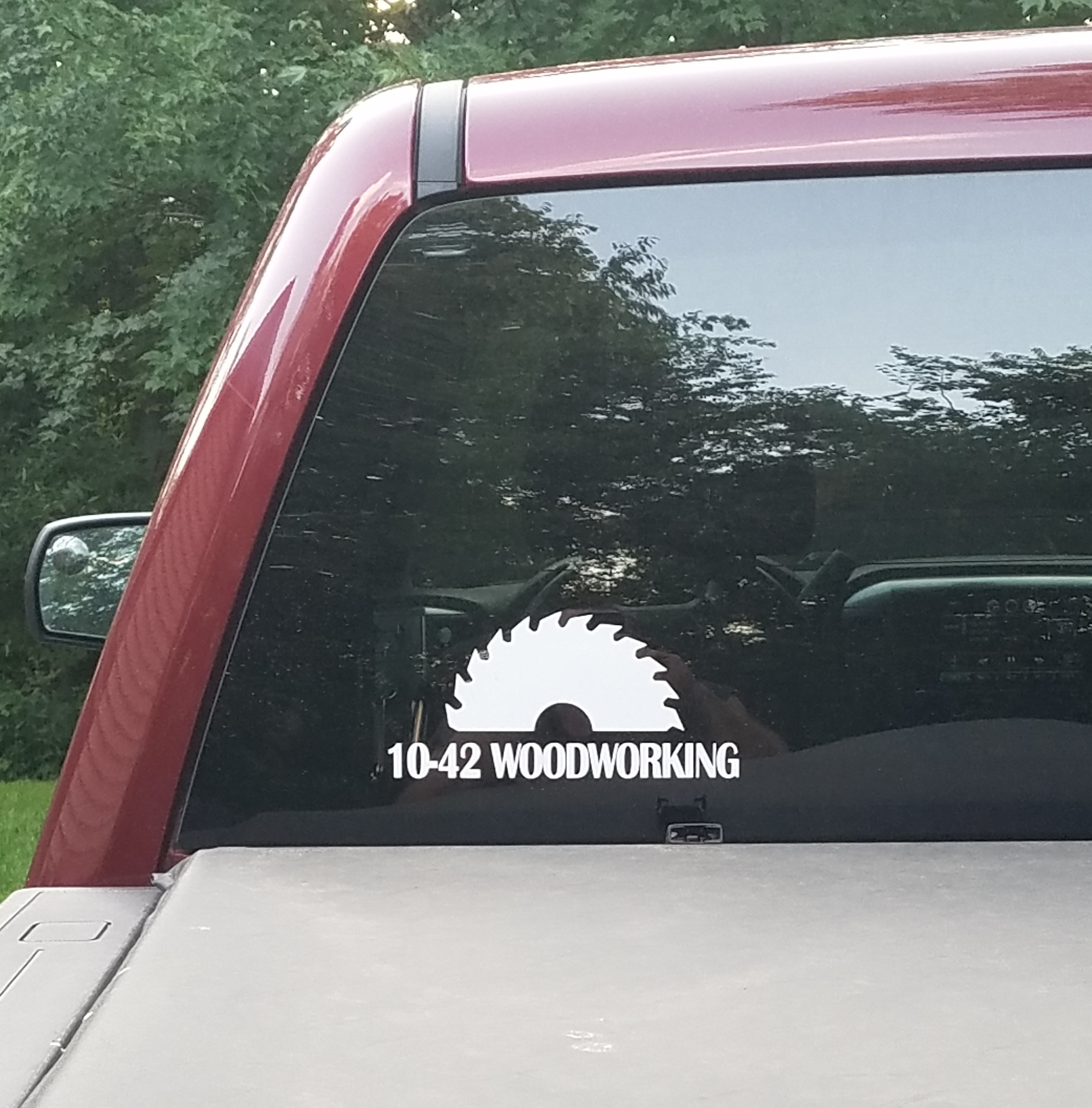 Picture of custom vinyl sticker to display in vehicle windows.